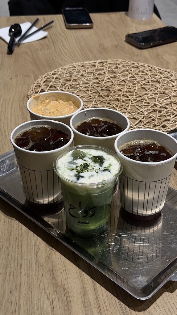 Iced matcha and iced coffees on a rawah serving tray